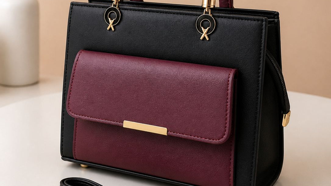 Black & Burgundy – "Women's two-tone handbag in black and burgundy with gold hardware and detachable shoulder strap"
